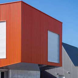 Maison en container bardage orange